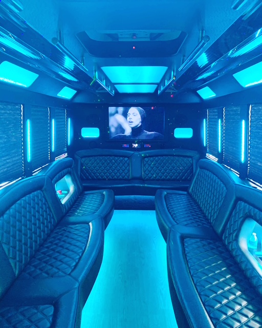 Luxury party bus interior with blue LED lighting